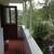 балкон с видом на ставочек и лес